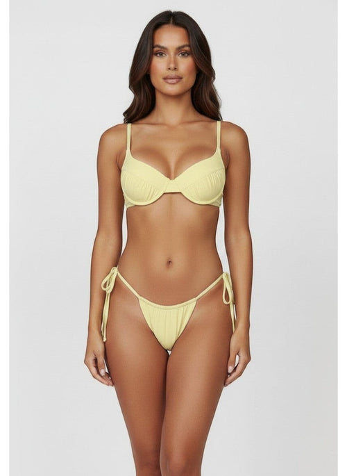 Belezini pastel yellow string bikini set with underwire top and adjustable tie-side bottoms. Stretchy fabric.