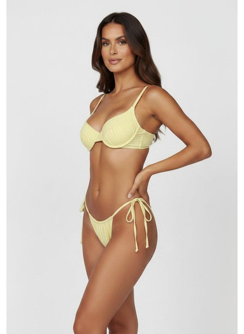 Belezini pastel yellow string bikini set with underwire top and adjustable tie-side bottoms. Stretchy fabric.