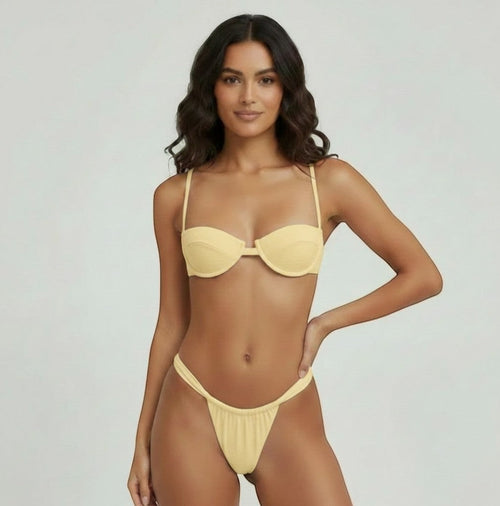 Belezini pastel yellow underwire bikini set with high-cut bottoms and adjustable straps.
